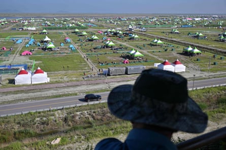 Empty camp spots can be seen on Tuesday as the Scout jamboree site is evacuated.