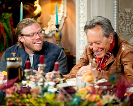 Beckett and Grant smiling as they sit alongside each other in conversation