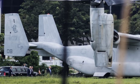 US President Donald Trump prepares to board Marine One in Manila.