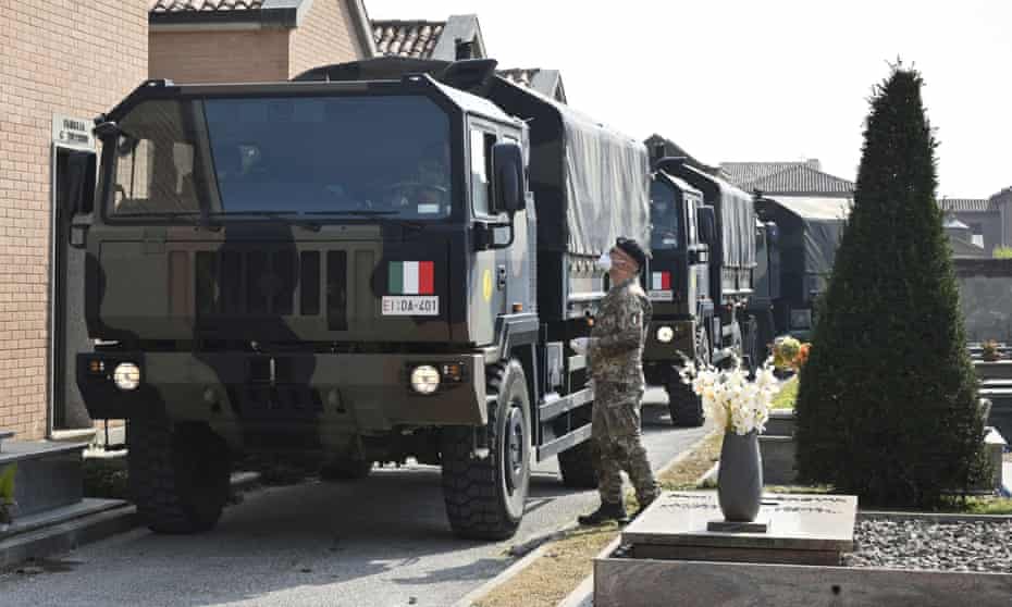 A convoy of Italian army trucks arrives from Bergamo carrying bodies of coronavirus victims to a cemetery at Ferrara.