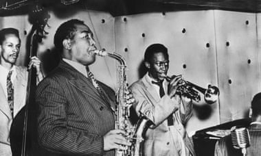 Charlie Parker, Miles Davis, and Tommy Potter<br>perform at the Three Deuces in 1947