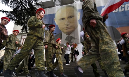 Young people take part in a procession to mark the ninth anniversary of the Crimean annexation from Ukraine in Yalta in March.