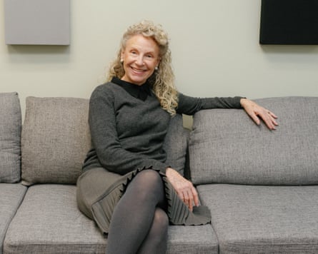 Elizabeth Barbour, on a sofa, smiling