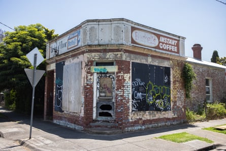 Melbourne ghost signs story. Bushells coffee signs on a boarded up shop in Bent Street, Moonee Ponds. Australia.