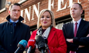 Sinn Fein Vice President Michelle O’Neill with party colleagues John Finucane (left) and Chris Hazzard (right).