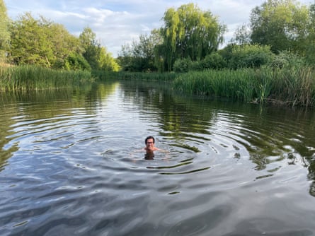 The writer swimming at Bodney Hall Farm.