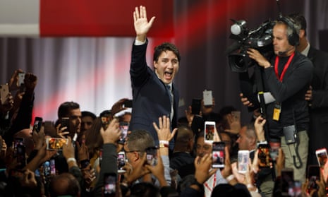 Trudeau celebrates his narrow election win in Montreal.