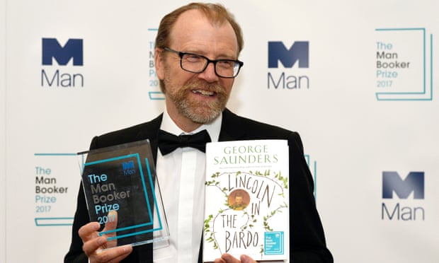 George Saunders, author of ‘Lincoln in the Bardo’, poses for photographers after winning the Man Booker Prize for Fiction 2017 in London, Britain, October 17, 2017. REUTERS/Mary Turner