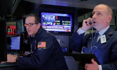 Traders on the floor of the New York Stock Exchange today, amid another brutal selloff