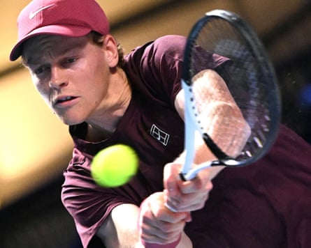 Jannik Sinner plays a shot