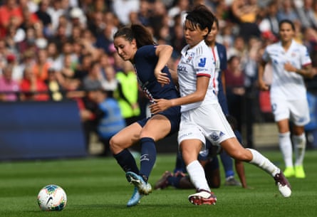 Paris Saint-Germain’s Sara Dabritz holds off Lyon’s Saki Kumagai during the Champions Trophy final in September 2019.