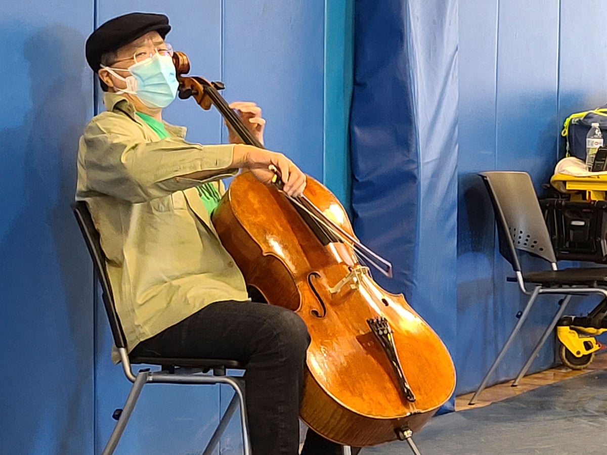 Cellist Yo-Yo Ma gives impromptu performance at Covid vaccine centre | US news | The Guardian