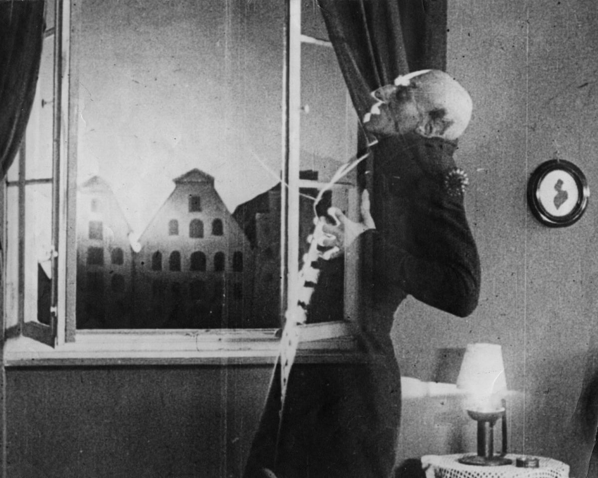 vampire next to a window starts to fade and disappear