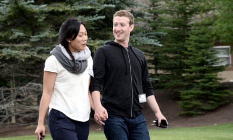 A file picture dated 11 July 2013 of Mark Zuckerberg (R), chief executive officer and founder of Facebook Inc., and wife Priscilla Chan (L).