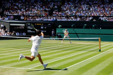 Carlos Alcaraz rips a forehand towards Taylor Fritz in their semi-final
