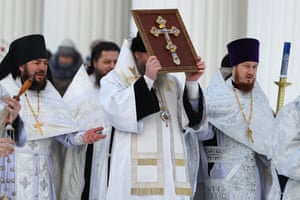 Kineshma, Russia: Orthodox priests perform a water blessing service at the Dormition Cathedral of the Holy Trinity, on the eve of Epiphany, a Christian feast celebrated on 19 January