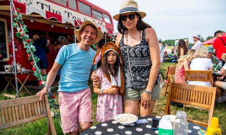 Happy little campers: Glastonbury ready to welcome more children than ever | Glastonbury 2023 3 Georgie and her parents, John Moss and Cristina Martinez-Gonzales.