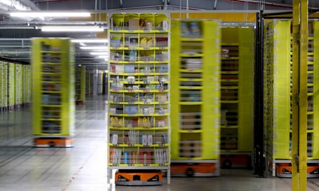 products on robotic racks at the amazon fulfilment centre in tilbury, essex