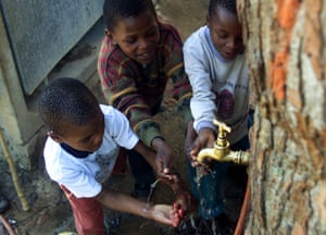 Township children celebrate Cape Town’s temporary victory over drought.