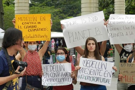 Activists take part in the Global Strike for Climate on 15 March 2019 in Medellín, Colombia