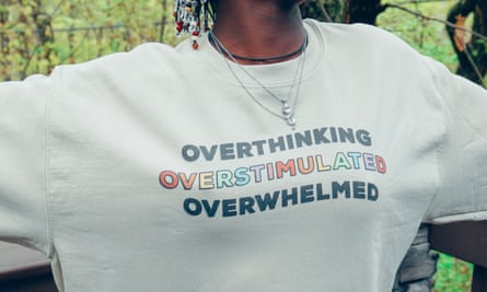 A sweatshirt branded with a mental health-themed slogan.