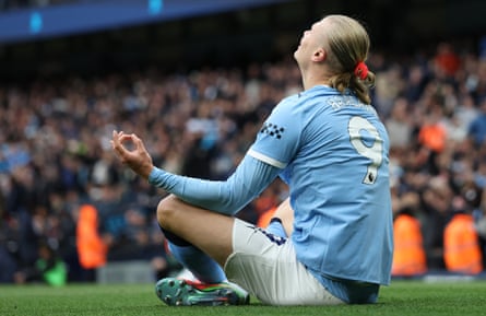 Erling Haaland performs his trademark goal celebration