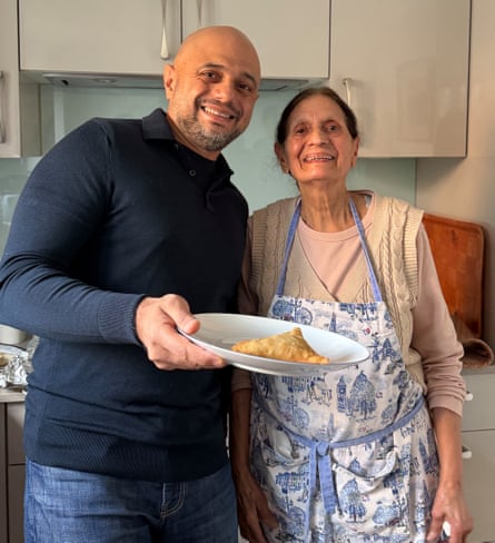 Javid with his mother at her home.