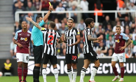 from?  I?  Newcastle United's Bruno Guimaraes received a yellow card from referee Andy Madley as Kieran Trippier and Sandro Tonali disagreed with the decision.