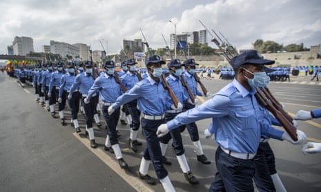 Ethiopian police march in Meskel square in Addis Ababa earlier this month. The state of emergency was imposed after the TPLF claimed to have captured several towns in recent days.