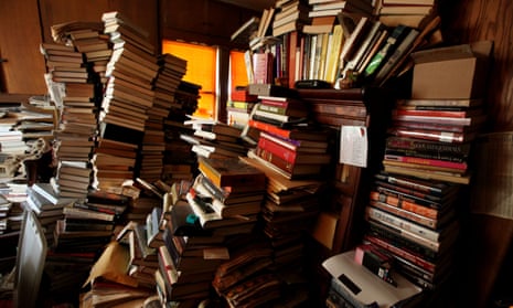 Room cluttered with books