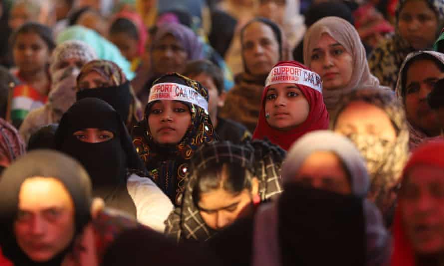 Muslim women listening to speeches during demonstrations at Shaheen Bagh.