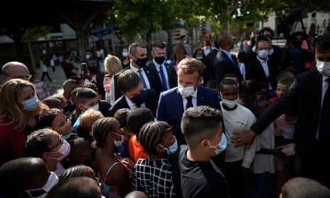 Macron visits Bouge primary school near Marseille.
