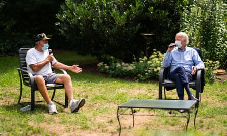 Joe Biden holds backyard conversation with union members during campaigning in Lancaster, Pennsylvania.