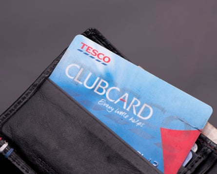 A wallet with a well-worn Tesco Clubcard sticking out of it
