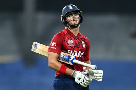 Jacob Bethell walks back to the pavilion after his dismissal for 21.