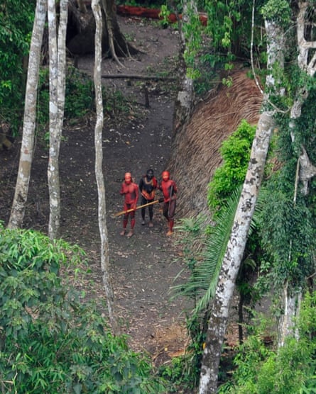 A photo made available on 1 February 2011 by Survival International shows members of an uncontacted tribe in the Brazilian Amazon.