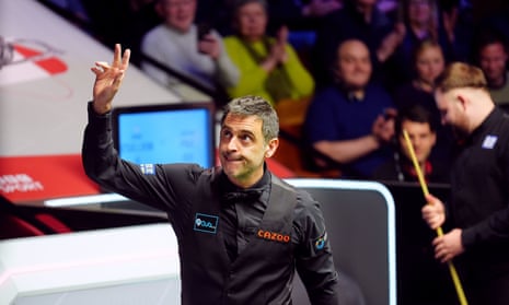 Ronnie O'Sullivan acknowledges the crowd after winning his first round match against Jackson Page at the Crucible