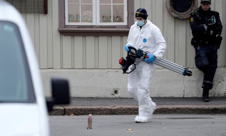 A forensic expert at the scene of the attack in Kongsberg, south-eastern Norway.