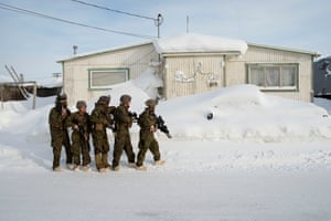 Marines practice room clearing in buildings outside a US National Guard Barracks in Utqiagvik, formerly known as Barrow, in Alaska. These marines were training for operating in cold weather environments and an upcoming deployment to Norway.
