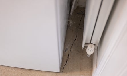 A crack in the floor at the home of Dayle Dixon and Mark Lee