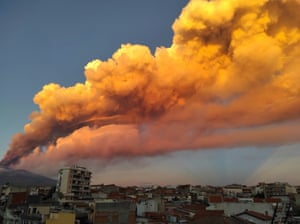A view of the Mount Etna eruption spewing ash, as seen from Paterno
