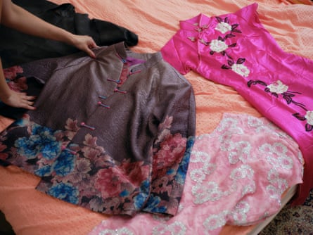 Clothing laid out on bed