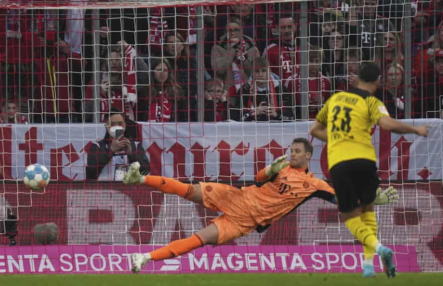 Dortmund's Emre Can scores his side's opening goal from the penalty spot.