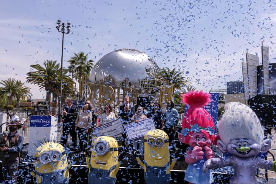 California’s governor, Gavin Newsom, celebrates with other guests after the Vax for the Win lottery contest.