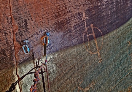 Bolt anchors placed near a petroglyph near Moab, Utah.