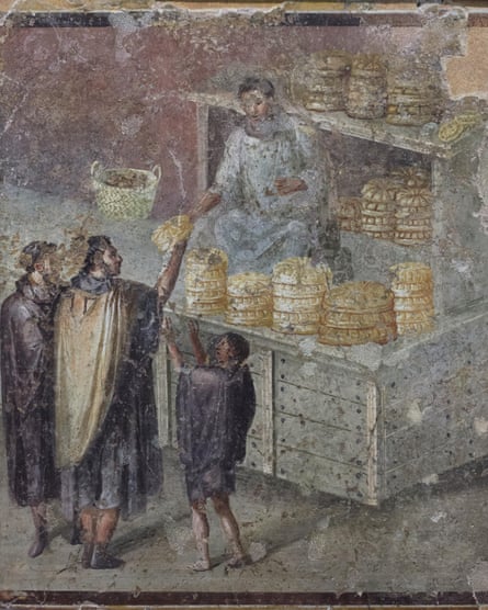 Customers buying bread, depicted in a fresco from Pompeii.