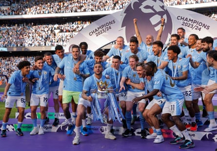 Kyle Walker, the City captain, about to lift the trophy after winning the Premier League in 2023-24.