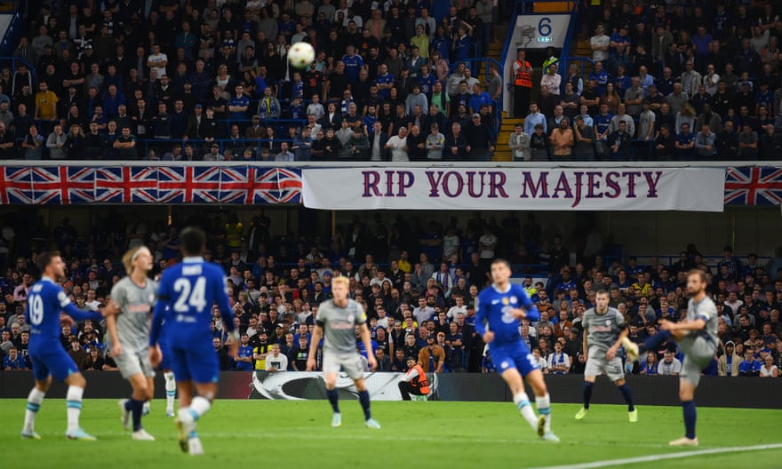A banner displays a tribute to the Queen at Stamford Bridge.