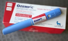 The injectable drug Ozempic balanced on a box