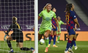 Wolfsburg’s Fridolina Rolfö celebrates after scoring the winner in the semi-final against Barcelona